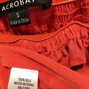Acrobat 100% Silk off-shoulder blouse